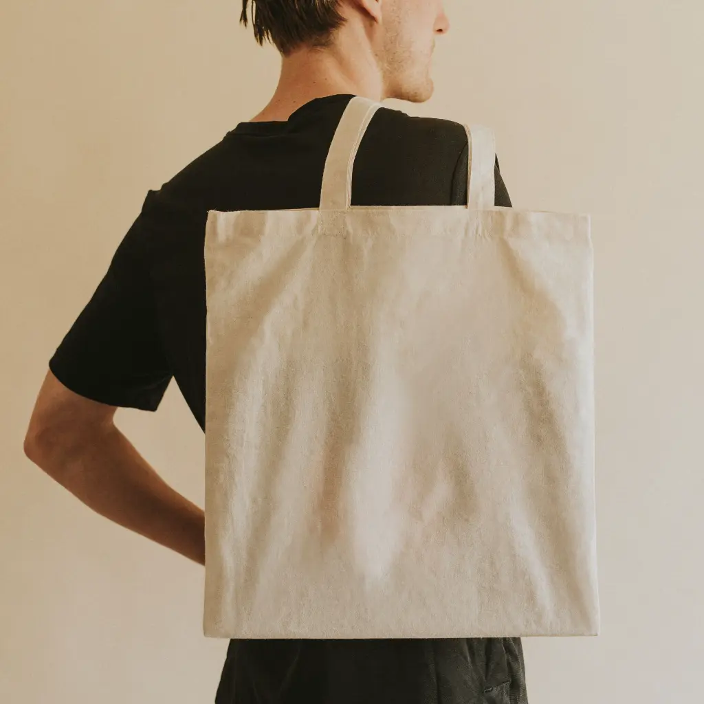 back-view-man-carrying-tote-bag.webp